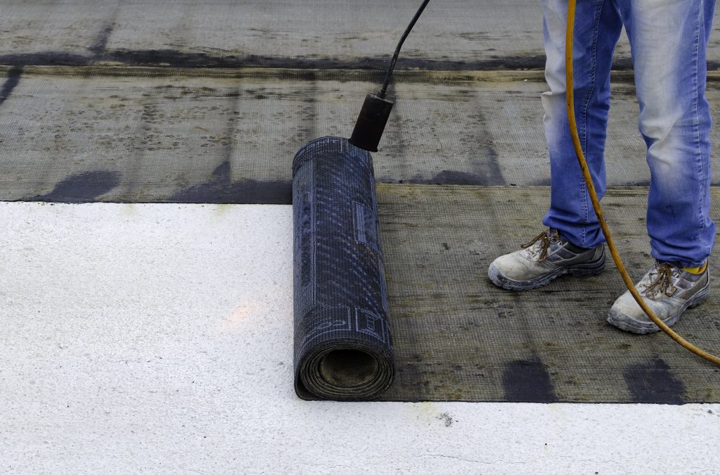 specialist waterproofing contractors applying sheet membrane